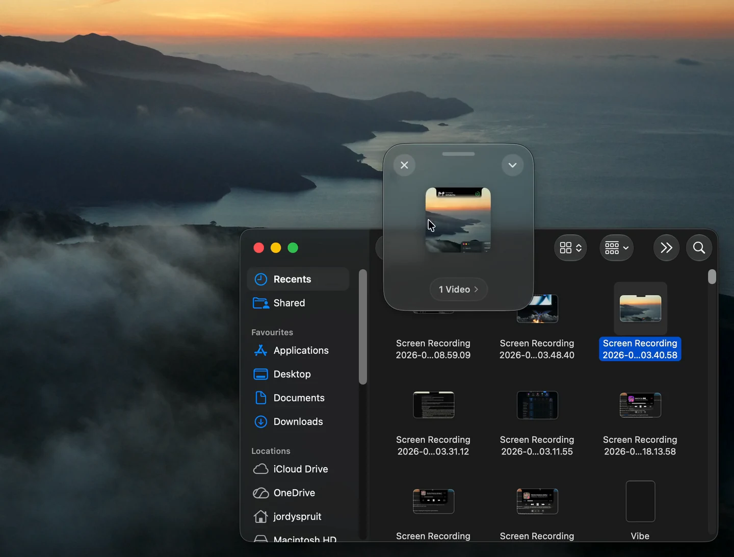 Droppy Basket holding temporary files above a Finder window