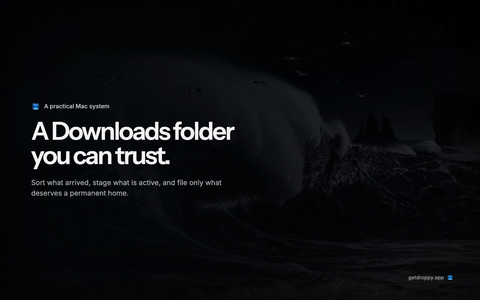 An ocean photograph with editorial typography about organizing Downloads