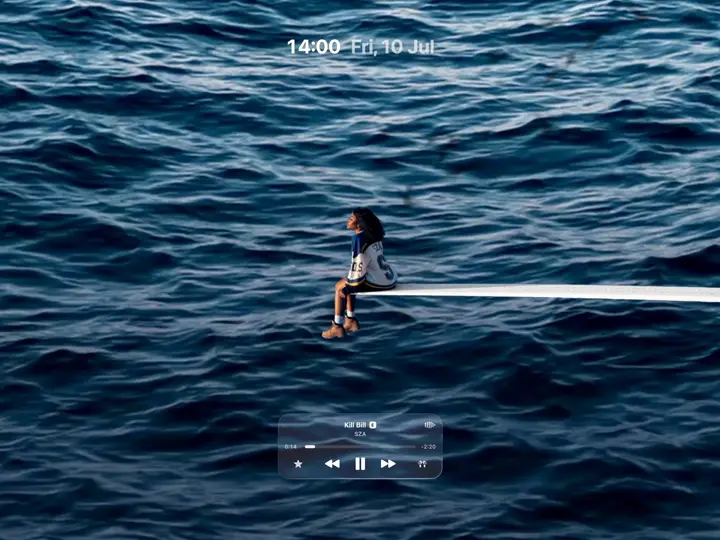 Droppy Lock Screen with fullscreen Kill Bill album artwork, time, date, and Apple Music controls